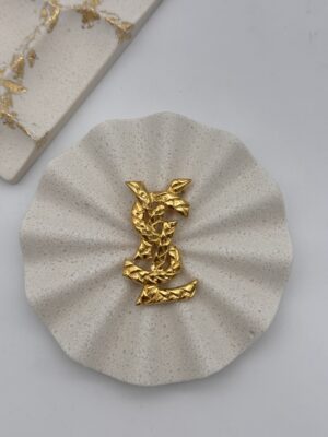 Broszka YSL Yves Saint Laurent (młotkowana faktura)