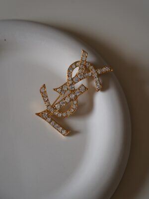 Broszka YSL Yves Saint Laurent wysadzana kryształkami